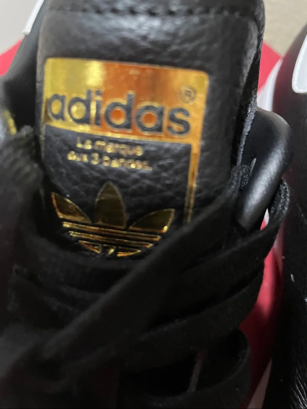 adidas Stan SmithBlack Leather Sneakers